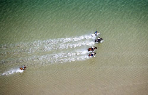 Aerial view of beach horse riding on Bertra Beach Co. Mayo on the Wild Atlantic Way Route